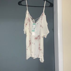 Cold shoulder top with flower pattern